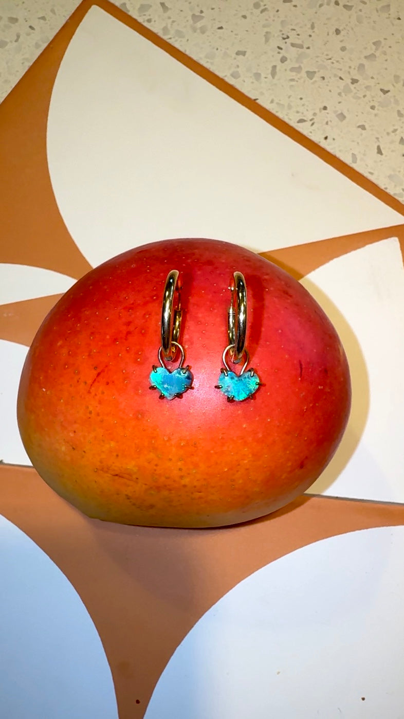 Cute Solid gold hoops with natural blue heart opal charms