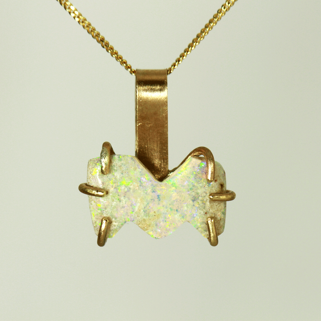 Side View Custom Opal Alphabet Letter in Solid Gold spinning