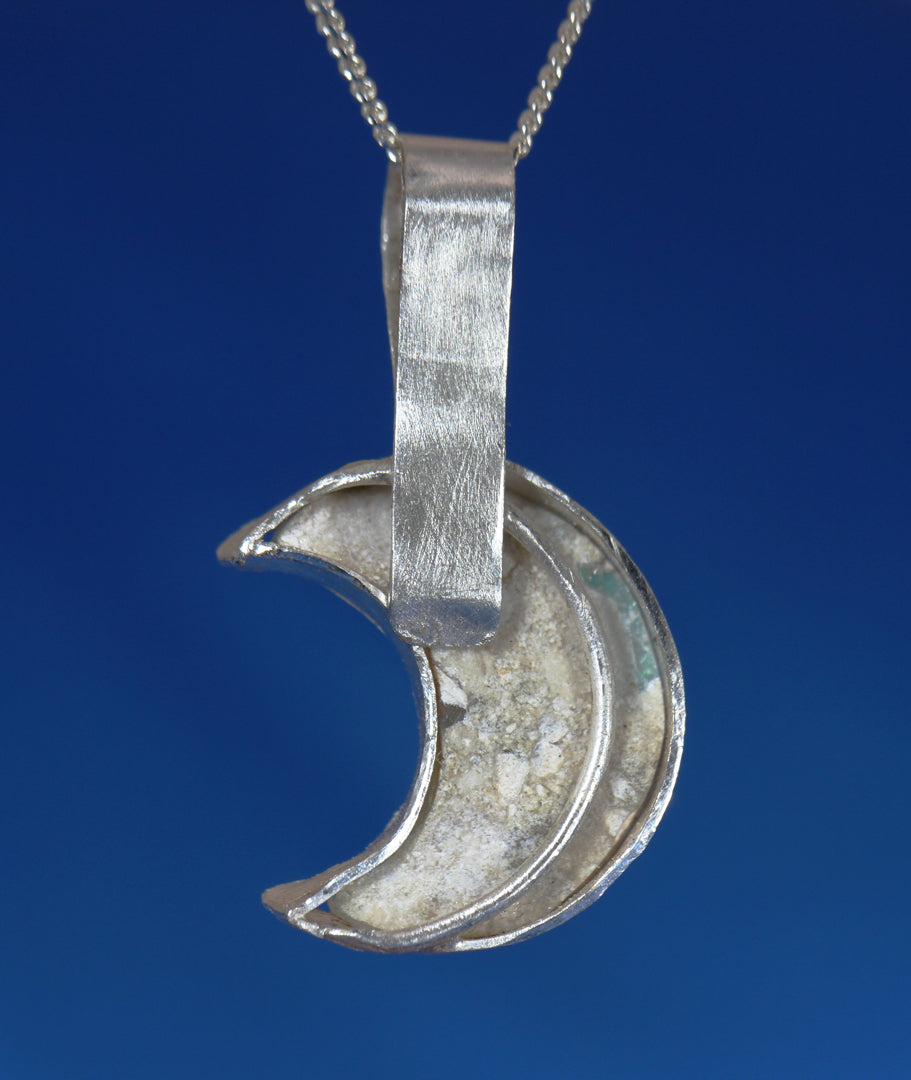 Crescent Moon Opal Pendant back view (Rough opal side).