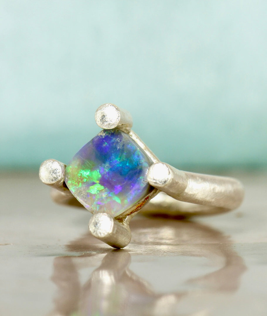 Blue opal solitaire sterling silver ring