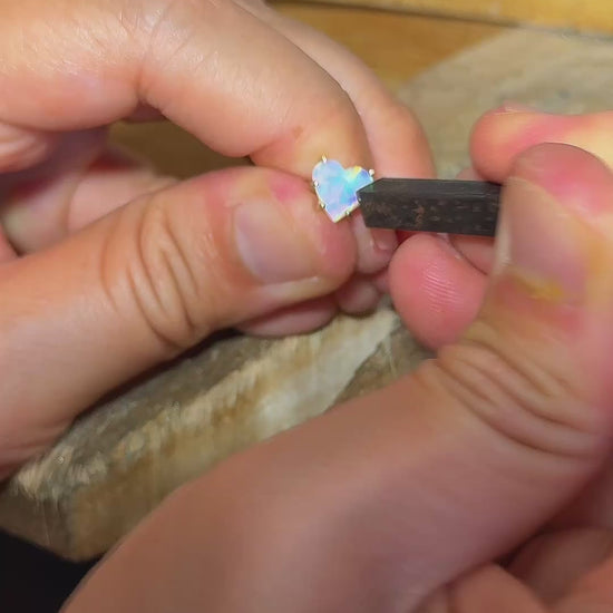 Process of setting the Rainbow Heart natural Australian crystal opal solid gold ring. 