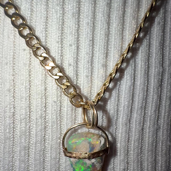 Unicorns Horn Opal pendant solid Aussie Opal Solid 9ct gold worn on the jeweller