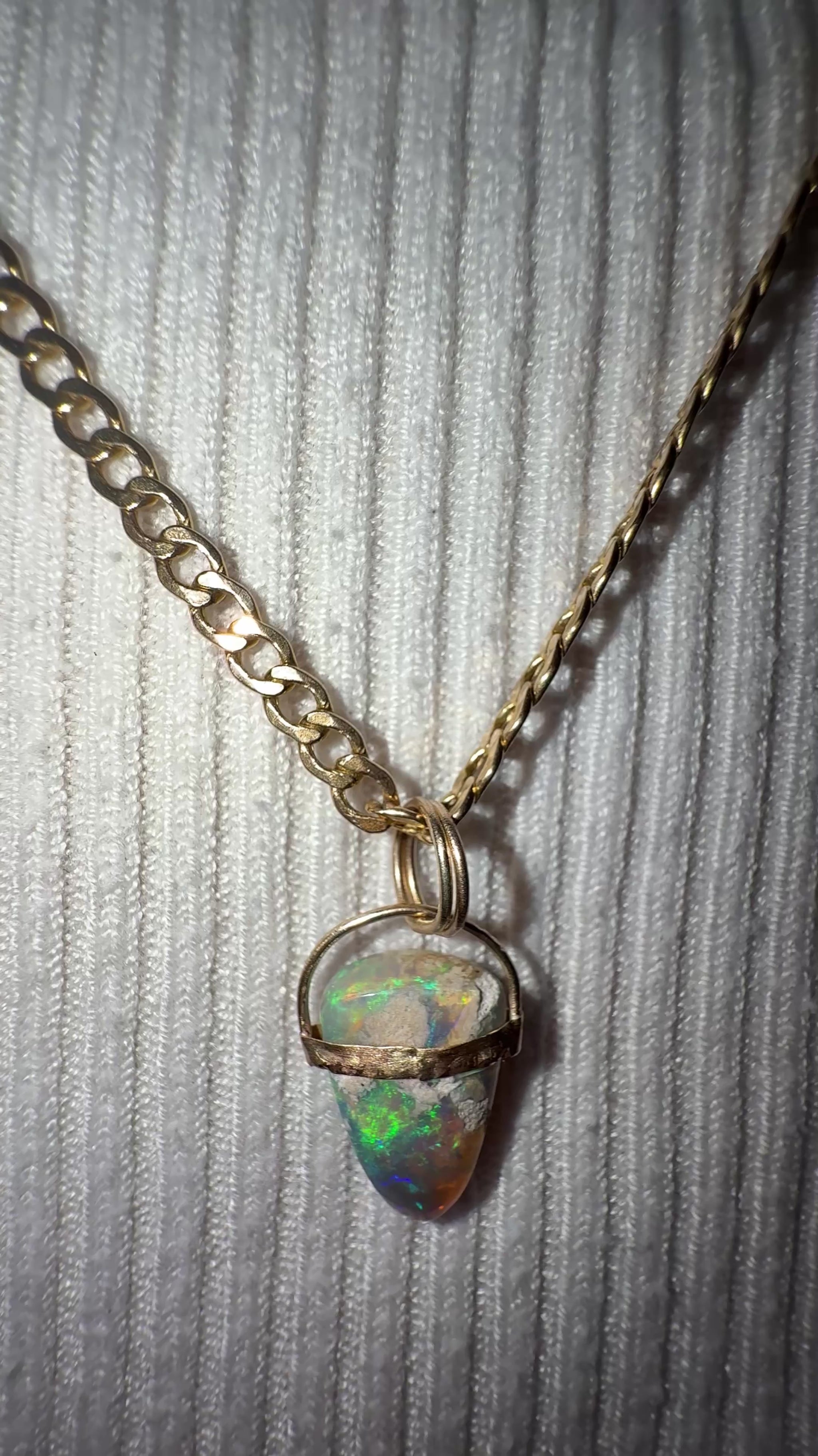 Unicorns Horn Opal pendant solid Aussie Opal Solid 9ct gold worn on the jeweller