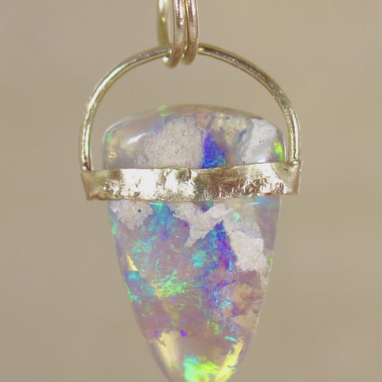 Unicorn's Horn Opal Pendant rotating around
